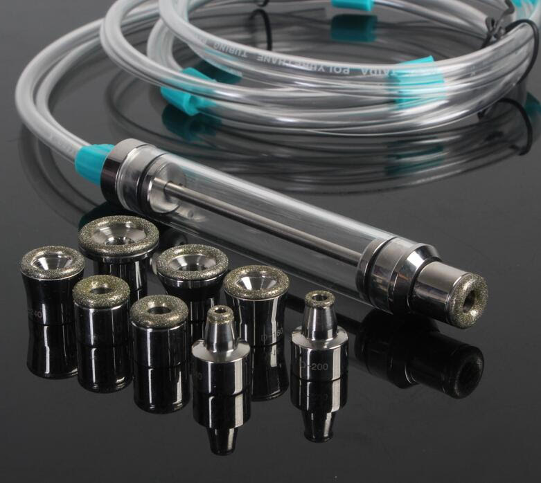 Diamond dermabrasion device for exfoliation using diamond crystal heads to improve skin texture.